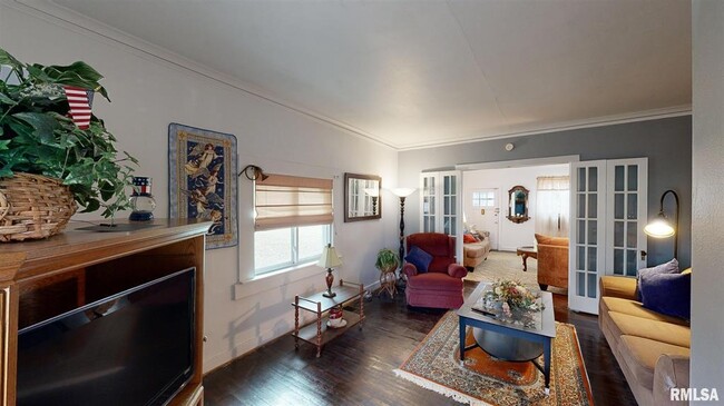 Family room with french doors - 13321 N Princeville Jubilee Rd