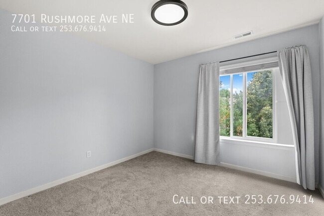 Building Photo - 7701 Rushmore Ave NE