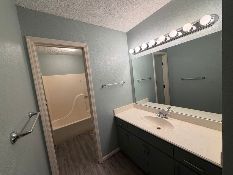 full bath with vanity and tub/shower - 1203 NW 6th Terrace