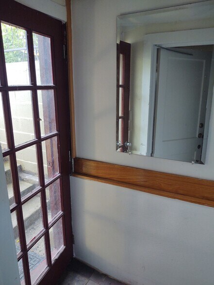 Hallway with mirror - 717 W S St