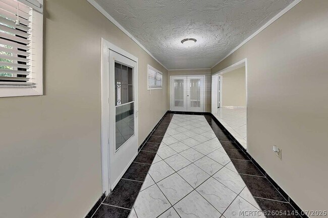 Building Photo - 9575 NW 25th Ct