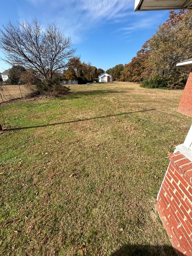 Building Photo - "Charming 4-Bedroom Home in Jonesboro with Cozy Fireplace & Gleaming Hardwood Floors!"