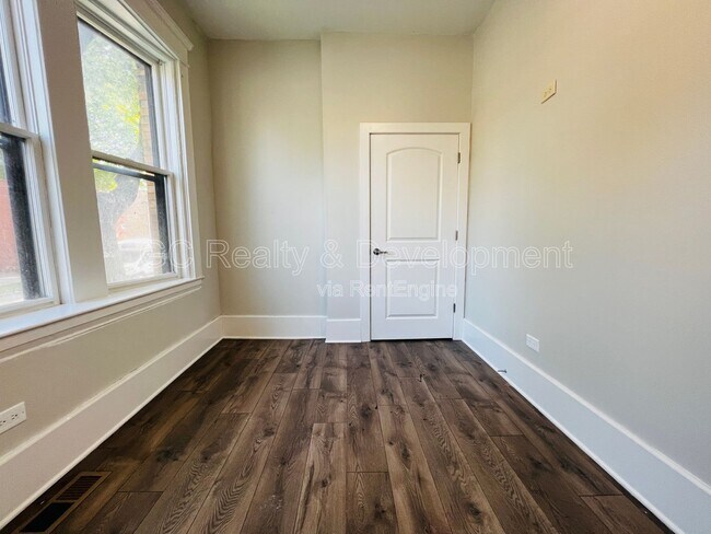 Building Photo - 6401 S Eberhart Ave