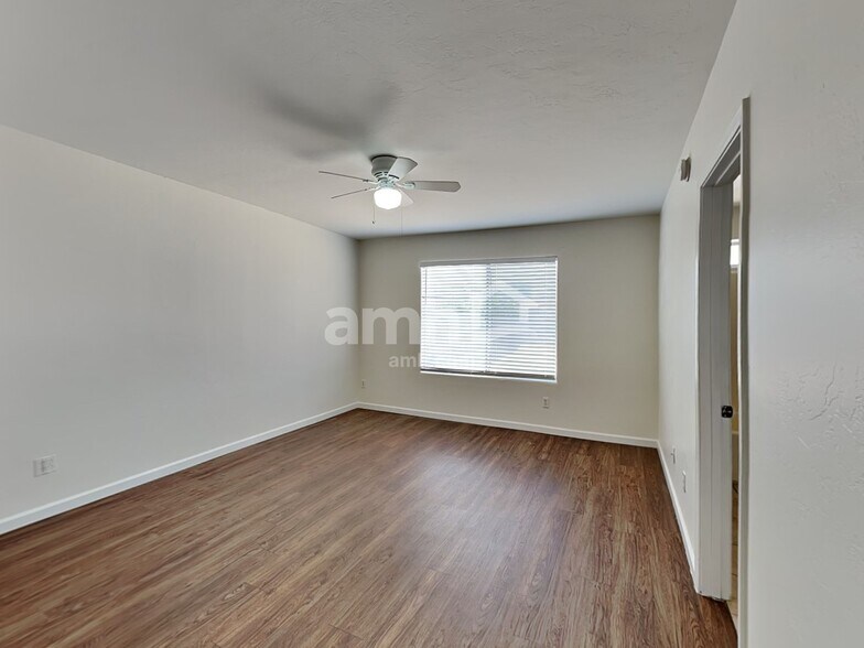 Building Photo - 6034 S Lostan Ave