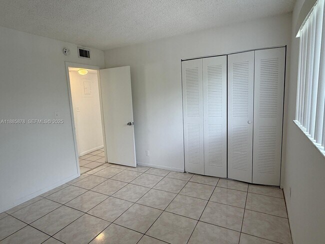 Building Photo - 8550 N Sherman Cir