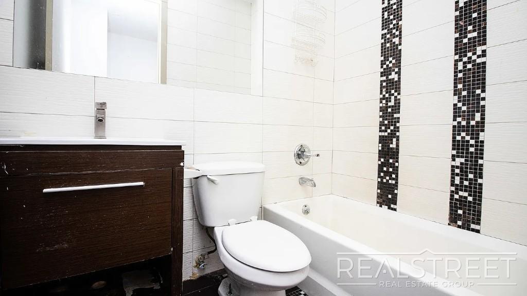 Building Photo - Gut-Renovated 3BR + Massive Finished Basement | Backyard, Laundry & HVAC | Bushwick