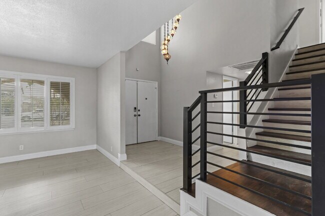 Building Photo - Welcome to your entertainers dream home with solar and pool service included!