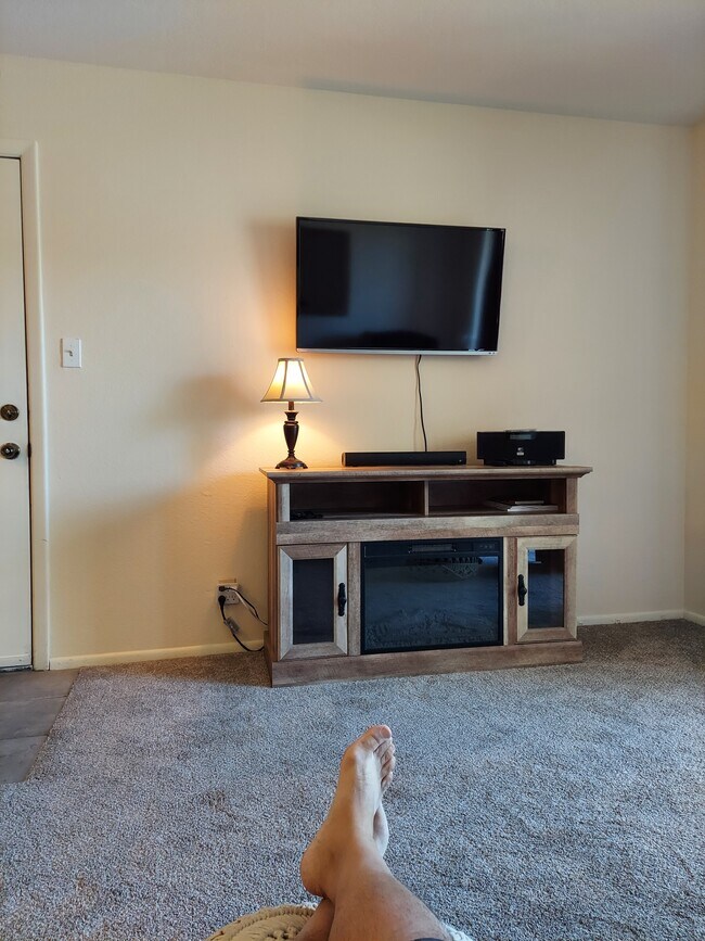 Flat Screen with Soundbar, Stereo, and Electric Fireplace Console - 941 Calle Mejia
