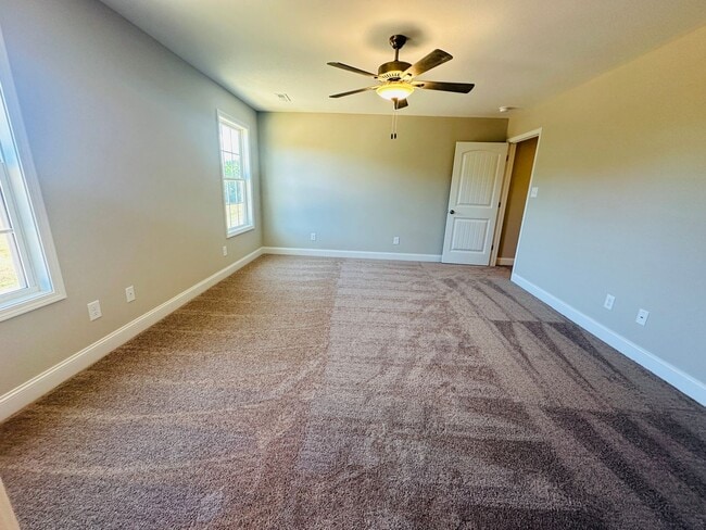 Building Photo - Beautiful Like-New 3 bed/2.5 bath w/ 2-car garage & fenced in backyard available June 24th!