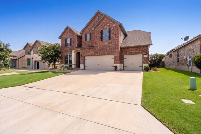 Building Photo - No Rear Neighbors, 3 Car Garage, a Chef's Kitchen, and Room for Everyone