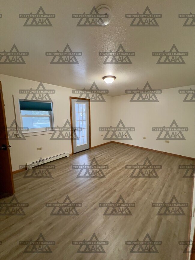 Building Photo - Spacious 3BR, 2.5BA Home off Chena Hot Springs Rd with Yard, Deck & Greenhouse