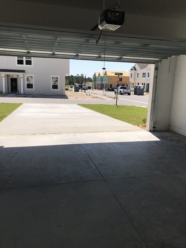 Building Photo - TWO BEDROOM TOWNHOUSE WITH LOFT AND PRIVTE...