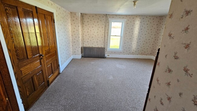 Building Photo - Country Living in This 4 Bedroom Farmhouse!