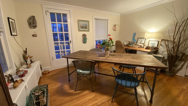 Living area, door to porch - 381 Bedford Rd