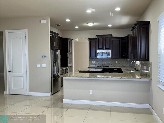 Building Photo - 9751 Blue Isle Bay