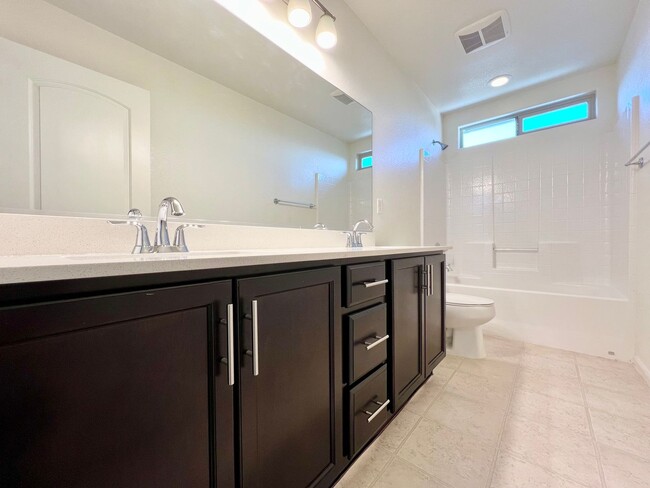 Building Photo - Coming Soon!!~ MODERN 4BD/3BA HOME IN GATED EL DORADO COMMUNITY! 2 AC UNITS! 3-CAR GR!