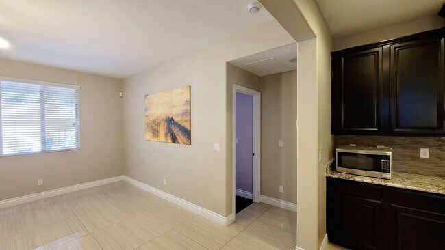 Building Photo - 7146 Flowering Rose Ave