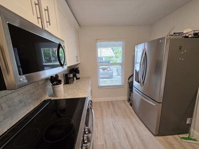 Building Photo - Updated full furnished 2/2 villa in great Safety Harbor location.