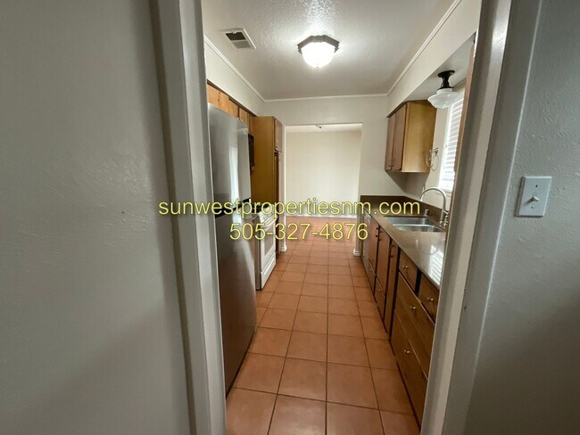 Building Photo - 3 Bedroom, 2 Bathroom with 2 Car Garage and Fenced Back Yard