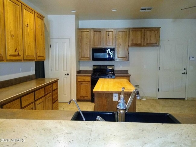 Building Photo - 242 N Pima Rd