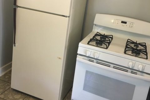 Full Fridge and Gas stove - 605 W 8th St