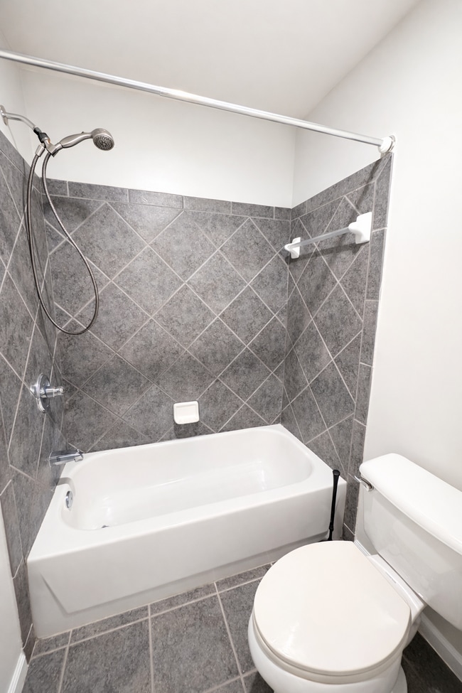 Building Photo - Gated Johns Creek Townhome Offering Space, Privacy, and Everyday Convenience