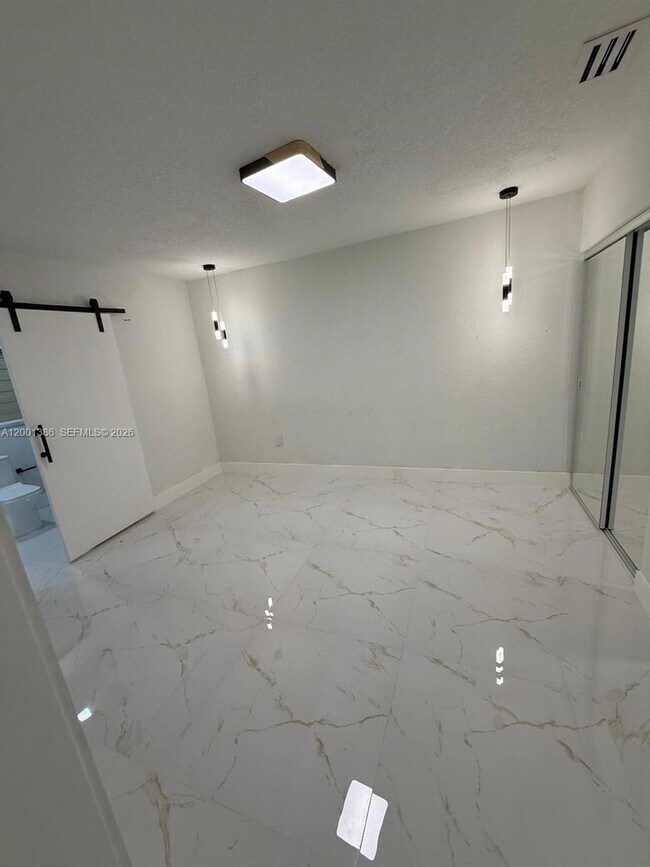 Building Photo - 10460 SW 26th Terrace