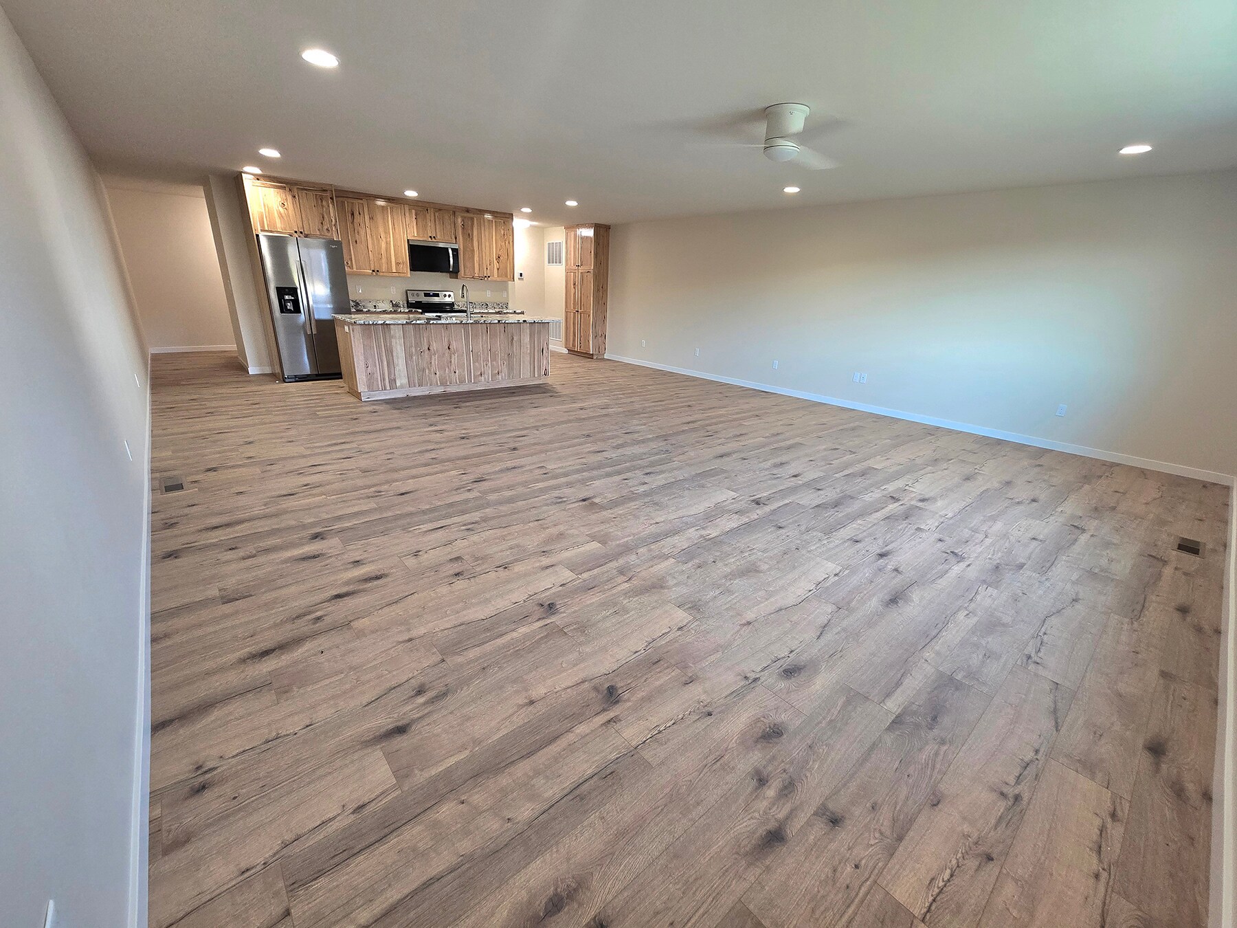 Open Concept Living and Kitchen with Ceiling Fan - 1408 Edington Ave