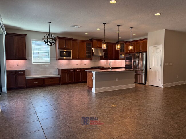 Building Photo - Entertainer’s Dream Home with Gourmet Kitc...