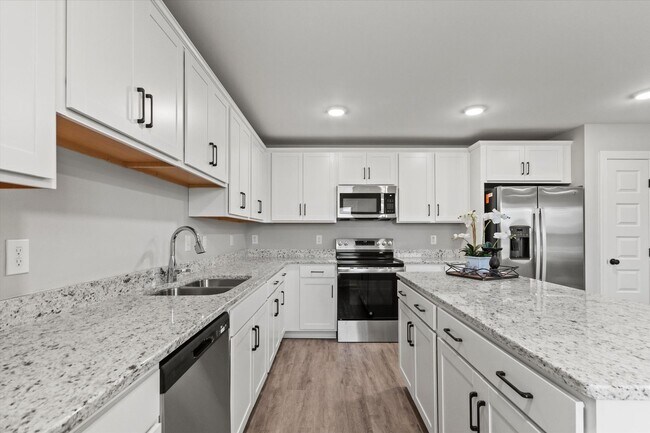 Building Photo - Stylish 4BR Townhome Living in the Heart o...