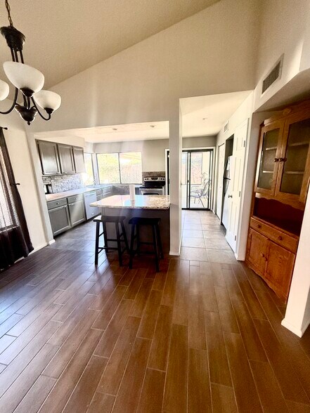 Open kitchen with refrigerator - 200 E Belcourte Pl