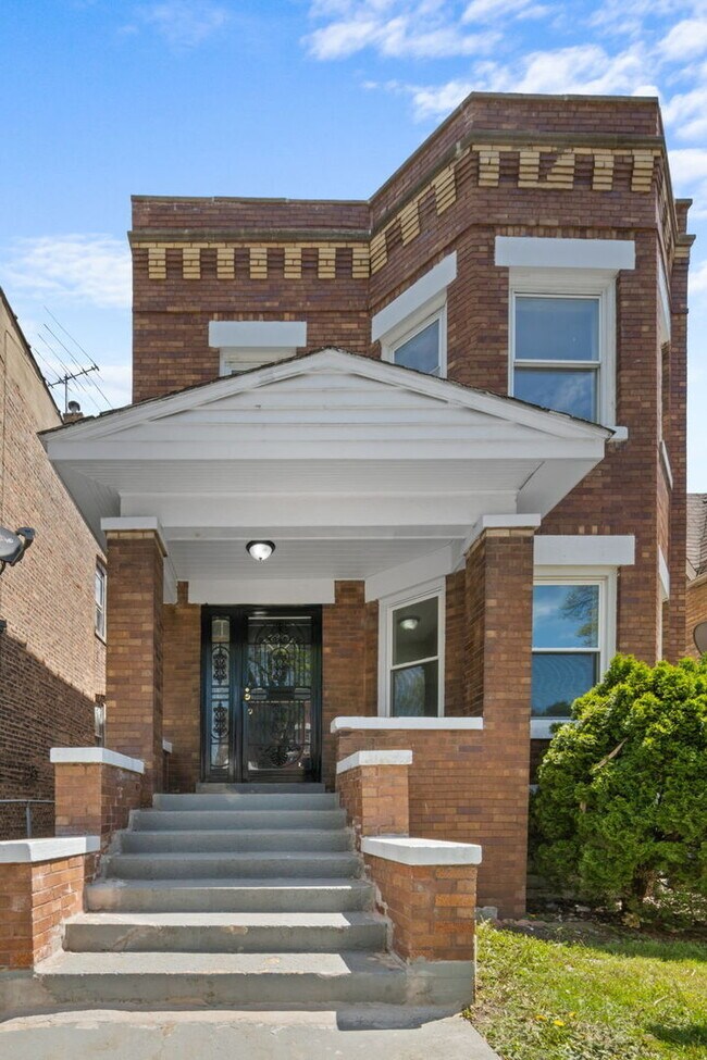 Building Photo - 1031 N Drake Ave
