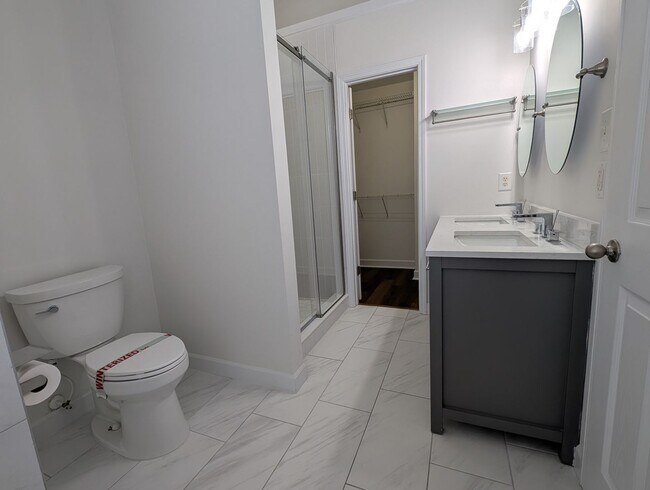 Building Photo - Pristine End Unit Townhome located in the Prosperity Place community!