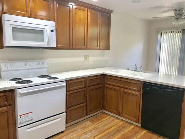 Building Photo - Beautifully Updated 2 Bed 1.5 Bath Condo in Merced Gated Community - Private Backyard! Community ...