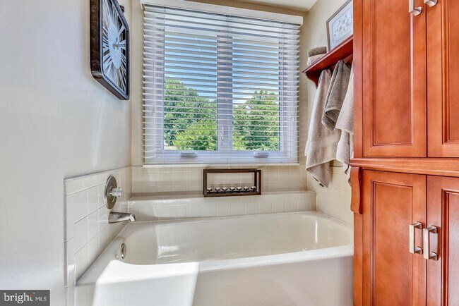 Building Photo - Experience elevated living in this beautifully renovated townhome nestled within the highly sough...