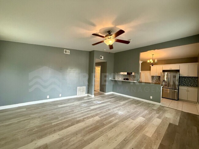 Building Photo - Fully Renovated 2BR Brick Home with Vaulted Ceilings & Backyard Retreat!