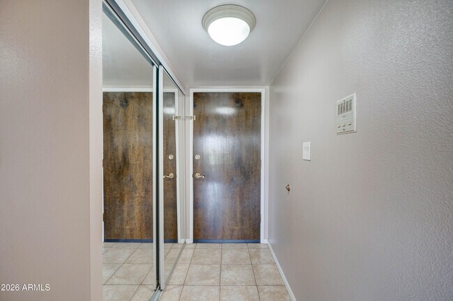 Building Photo - 7940 E Camelback Rd