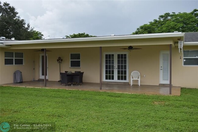 Building Photo - 7340 NW 11th Ct