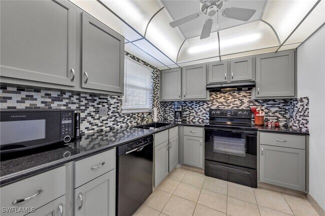 Building Photo - 12250 Tamiami Trl E