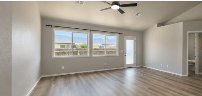 Building Photo - This three bedroom, 2 bath, single level home is ready for you! New paint, vinyl plank flooring, ...