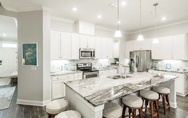 Building Photo - Upscale Modern Townhome nestled in the   G...