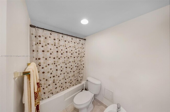 Building Photo - 5600 Collins Ave