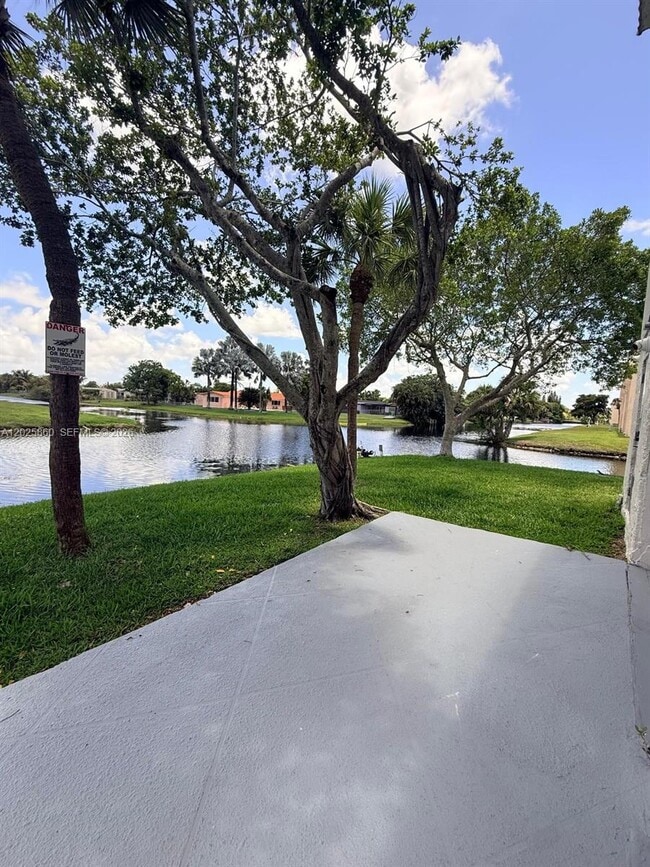Building Photo - 8595 Sunrise Lakes Blvd