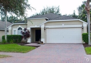 Building Photo - Beautifully Updated 4/3, Gated Community, ...