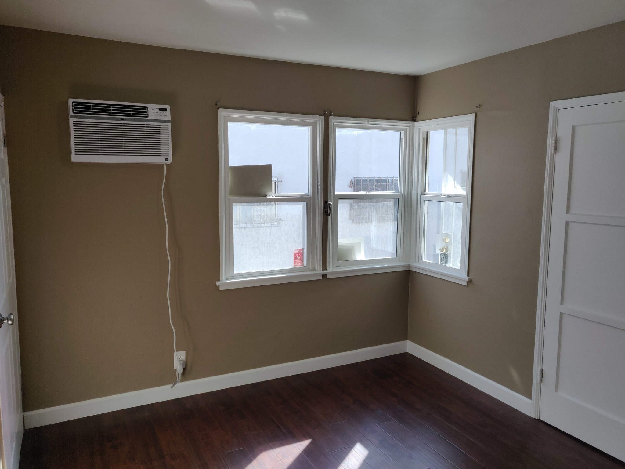 Bedroom south wall with new ac with remote - 6414 10th Ave