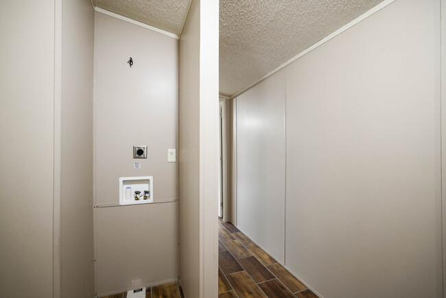 Hallway w/ stackable laundry hook-up. - 1225 Orizaba