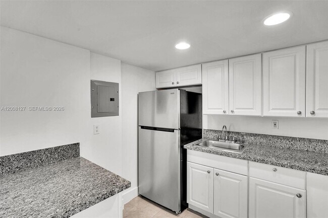 Building Photo - 4335 NW S Tamiami Canal Dr
