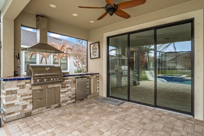 Building Photo - 4BR, 2.5BA home with resort style outdoor living!