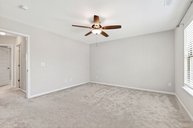 Building Photo - Beautiful 4BR End-Unit Townhome in Prime Apex Location!