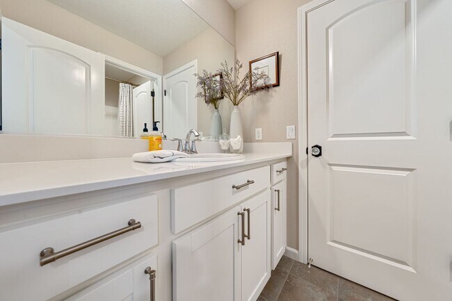 Building Photo - Designer Upgrades & Custom Touches in This...